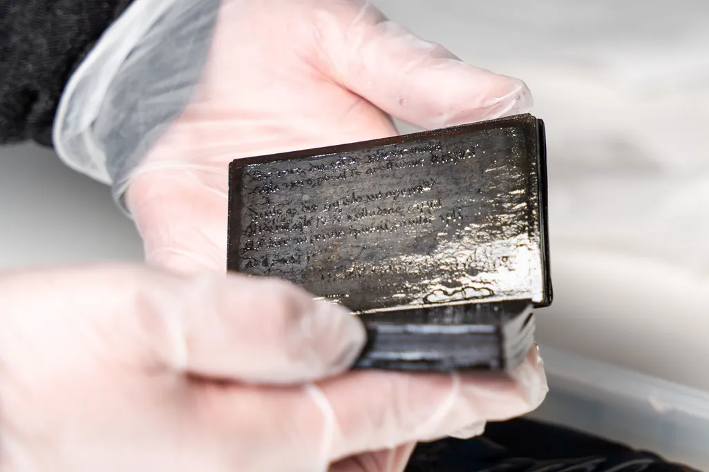 From a Medieval Latrine in Germany, Archaeologists Extracted a Pristine Leather Notebook That Preserved Latin Cursive for Centuries