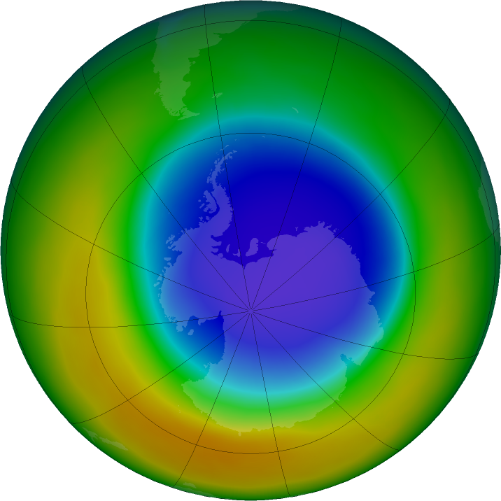 A blue circle of low density ozone over the Antarctic with a strong orange streak interrupting the blanket of green surrounding it, indicating high density ozone totals.