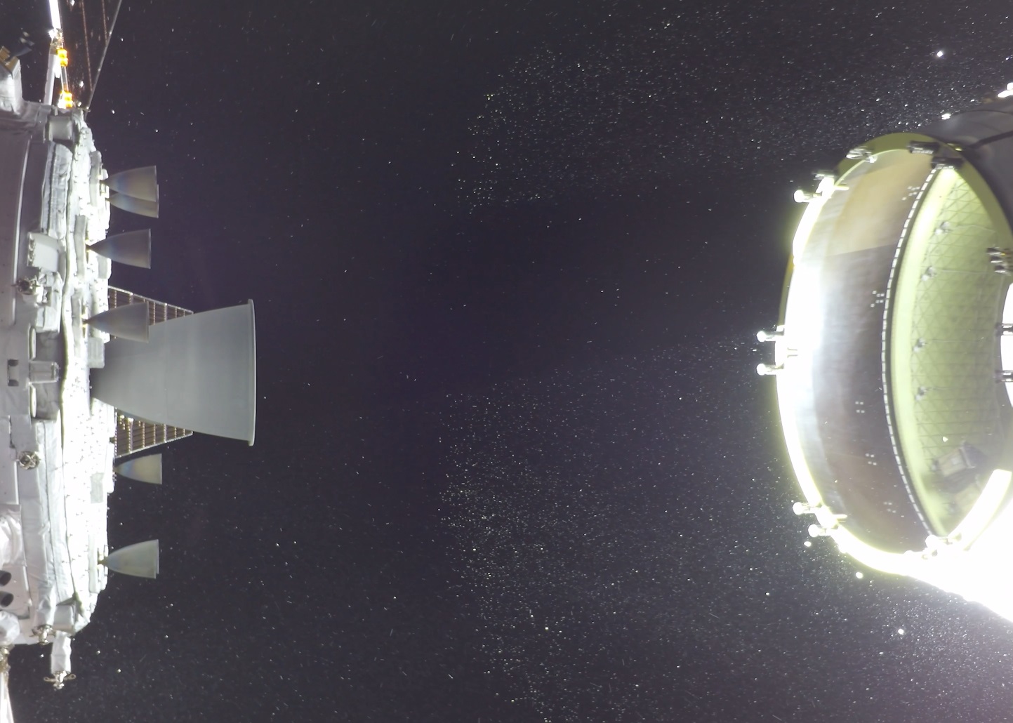 Two of the Artemis II CubeSats can be seen in the lower portion of the Orion stage adapter on the right side of the image.
