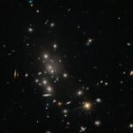 Hubble zachytil galaxie v zhluku MACS J1141.6-1905 Hubble Captures Galaxy Cluster