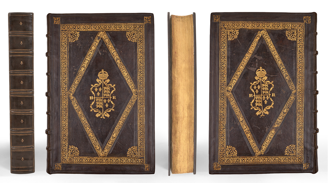 The leatherbound volume features Mary I's coat of arms and monogram.