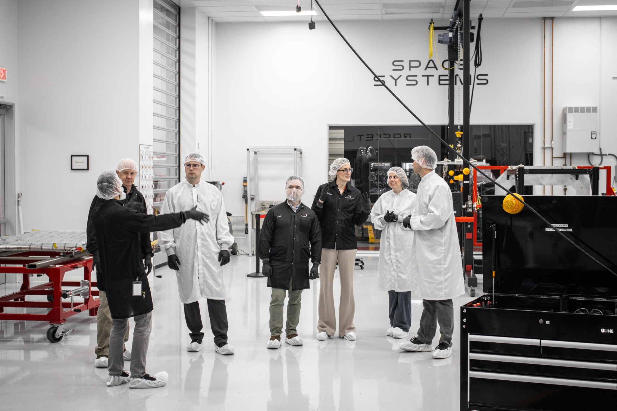 Members of NASA’s Cryogenic Fluid Management project tour Rocket Lab’s Spacecraft Production Complex in Long Beach, California, on Thursday, Feb. 12, 2026 . The portfolio project team had the opportunity to view the LOXSAT payload and the setup for vibration testing. Credit