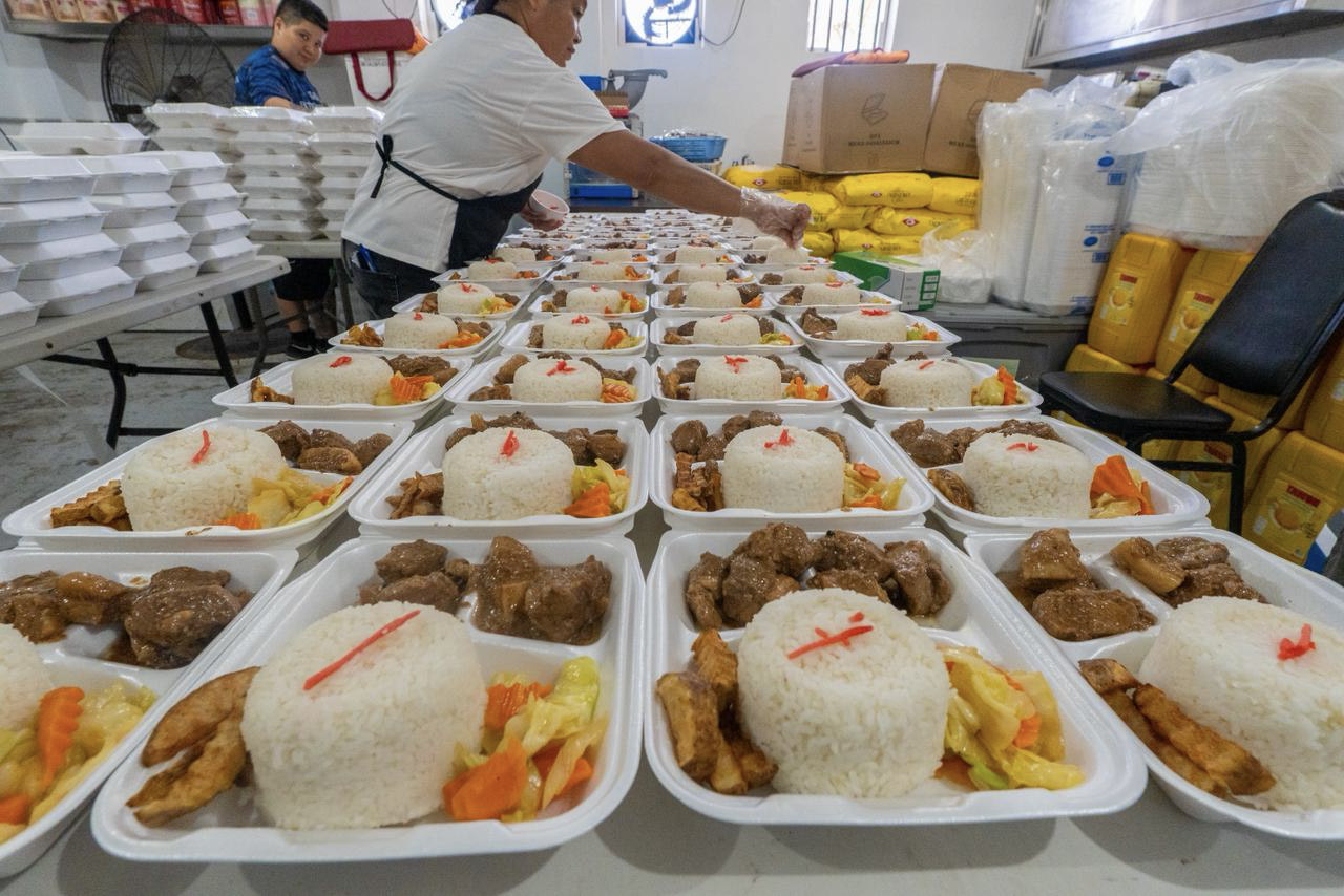 Preparation of meal packages for the Mariana Islands' community food distribution. Image by World Central Kitchen via Flickr (CC BY 4.0).