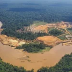 Ťažba kovov pre zelenú energetiku je v Afrike spojená s rozsiahlym úbytkom lesov Mining in a Wildlife Reserve, alongside a river in the Democratic Republic of Congo