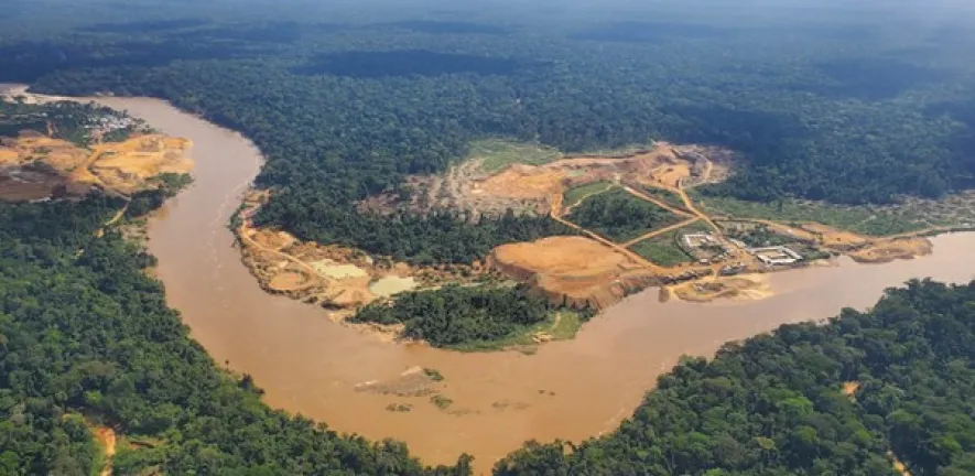 Mining in a Wildlife Reserve, alongside a river in the Democratic Republic of Congo