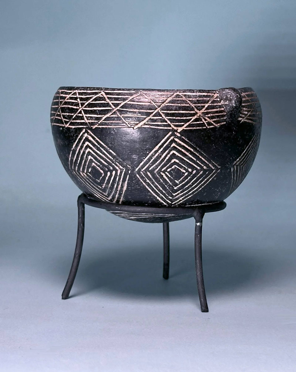 Black Polished ware hemispherical bowl with incised decoration