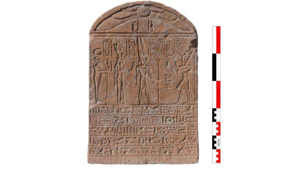 Photos from an archaeological dig, showing a brown stone tablet with hieroglyphics written on it, a group of people standing around the tablet, and a shot of the ruins of an ancient city
