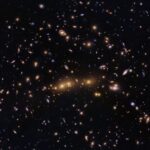 Hubble Glimpses Merging Galaxy Clusters