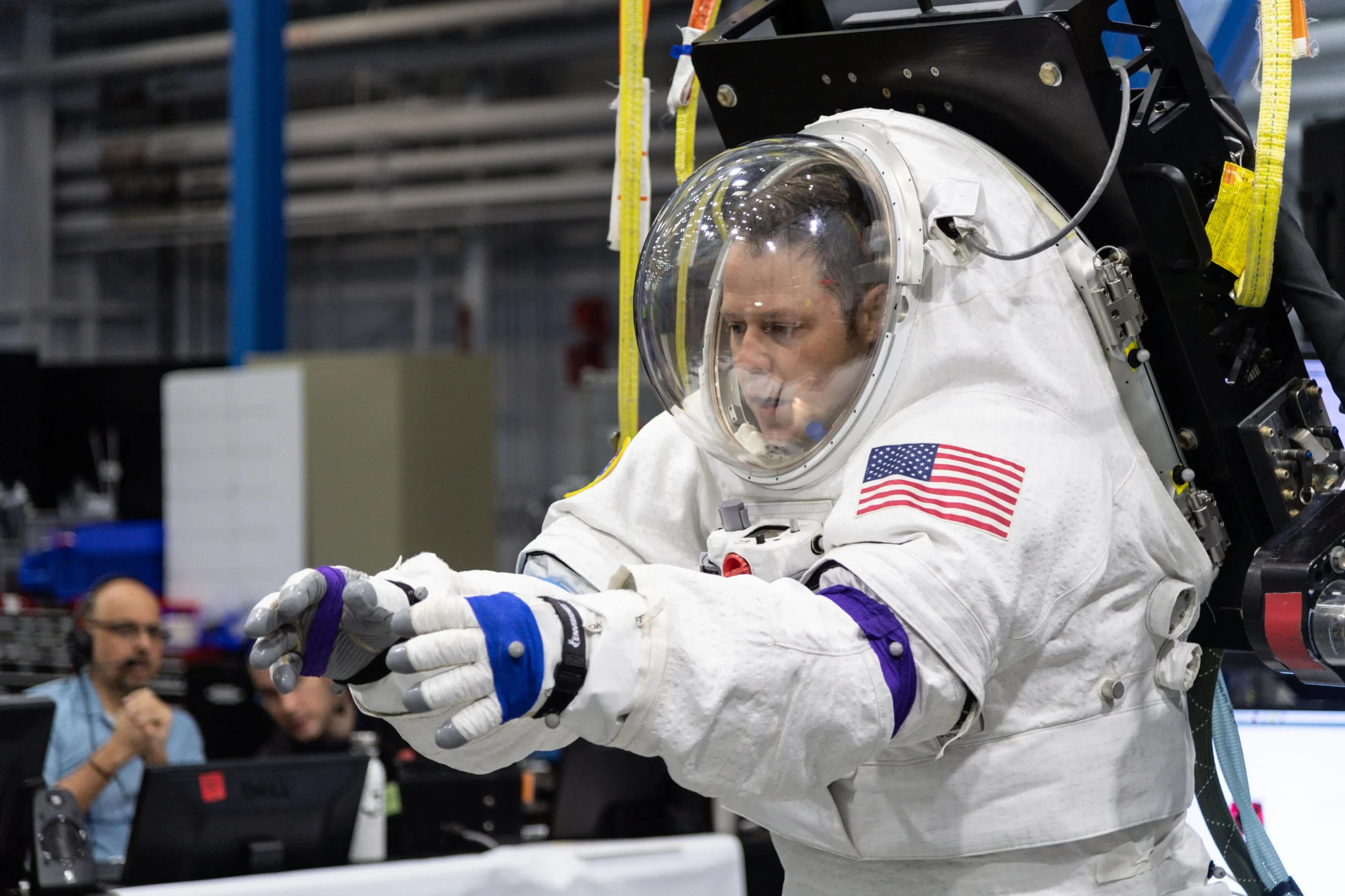 Scott Wray conducts a test of a NASA spacesuit using the Active Response Gravity Offload System.