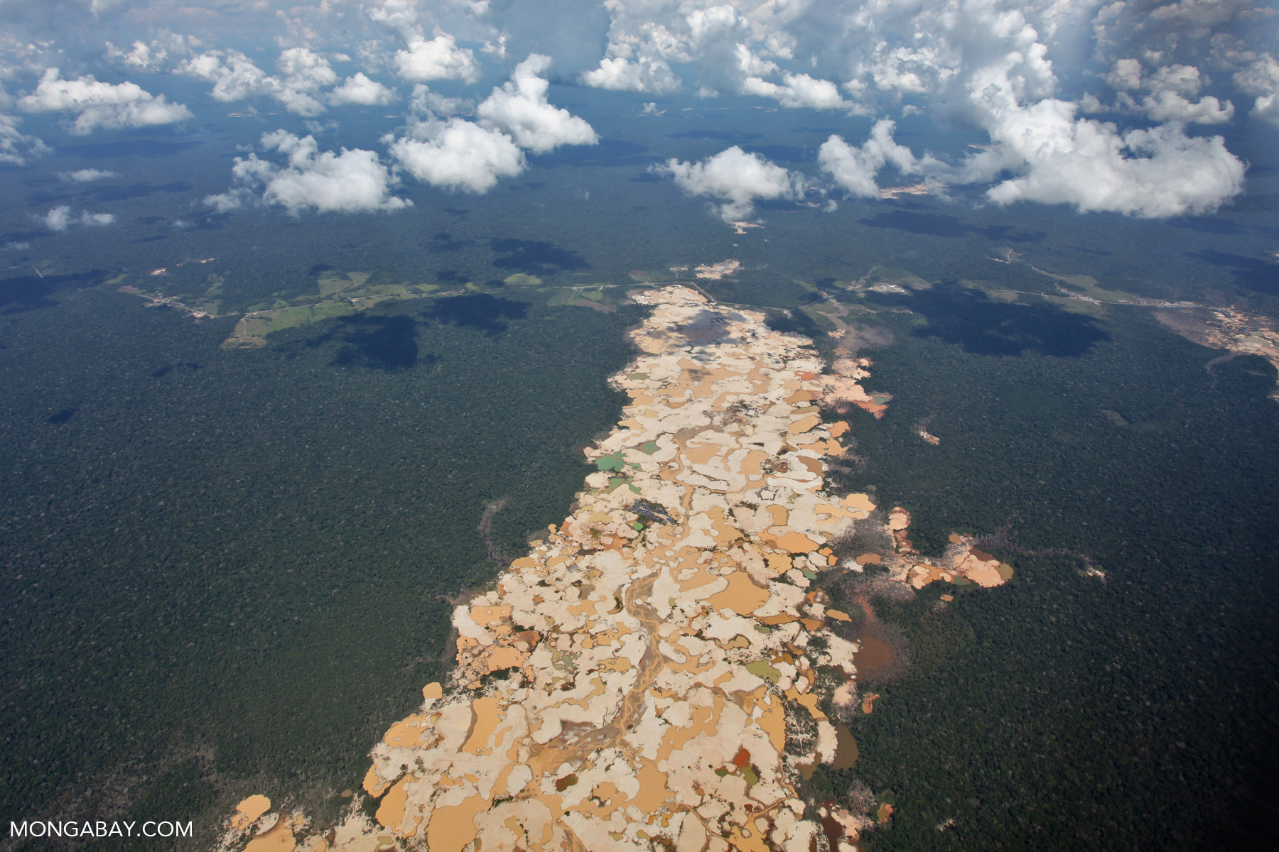 Peruvian Amazon landscape scarred by open pit gold mines.